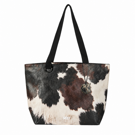 EMBER cow print Tyvek tote bag front view on white background