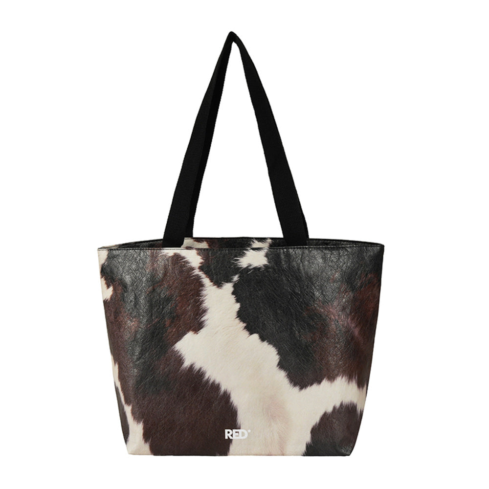 EMBER cow print Tyvek tote bag back view on white background