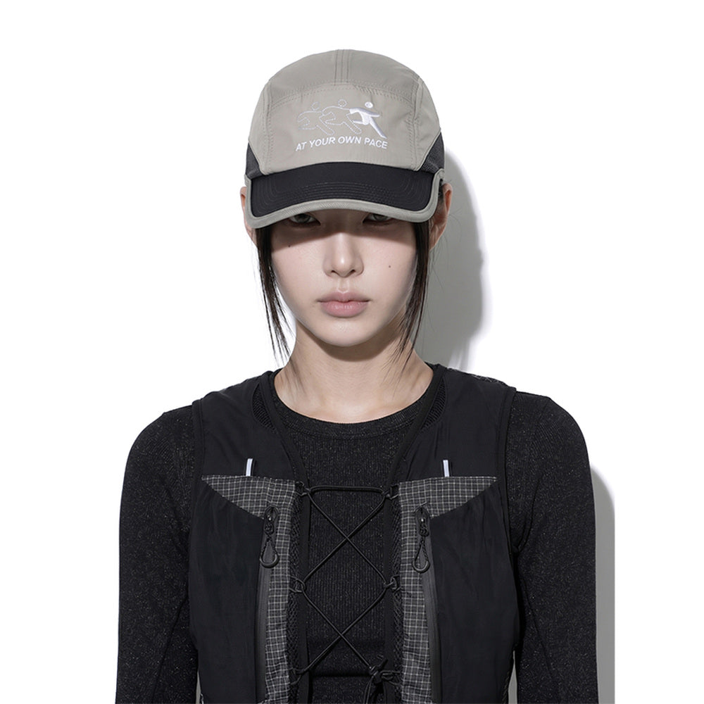 Model wearing REDRINSE ATHLETE lightweight mesh outdoor cap, front view