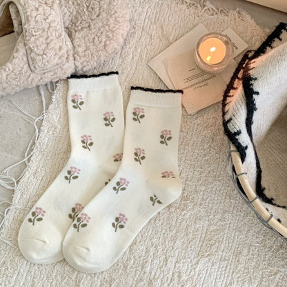 Ivory floral cashmere-blend socks with a ruffled cuff