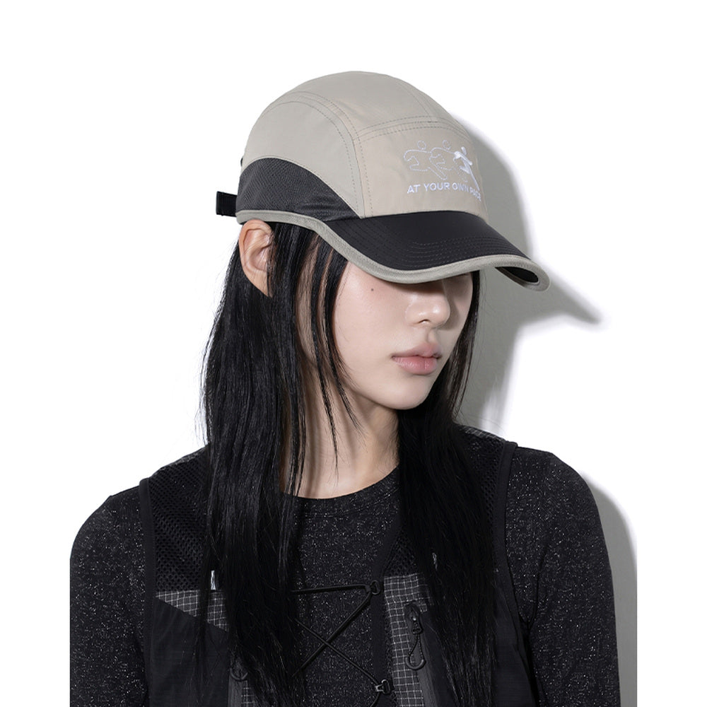Model wearing REDRINSE ATHLETE outdoor cap, side view