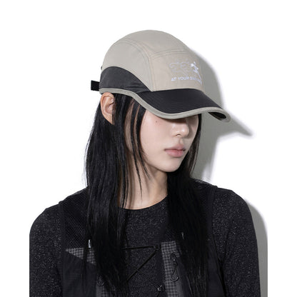 Model wearing REDRINSE ATHLETE outdoor cap, side view