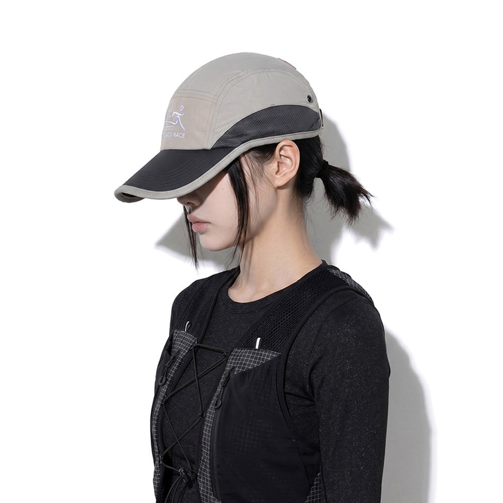 Model wearing REDRINSE ATHLETE outdoor cap, three-quarter side view