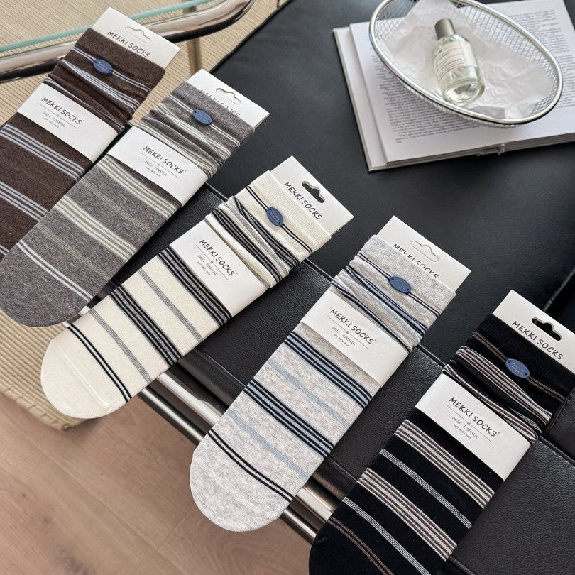 CHARM original five-color button-detail sock flat lay