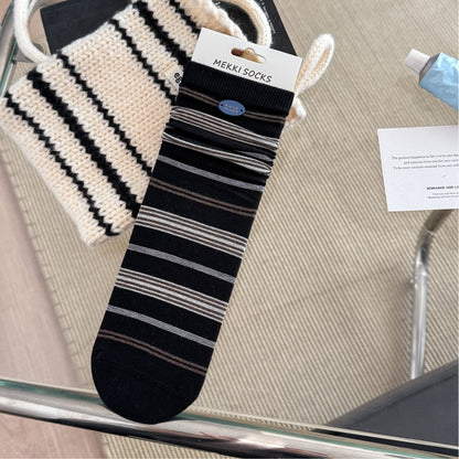 CHARM original black fine-stripe socks with blue button