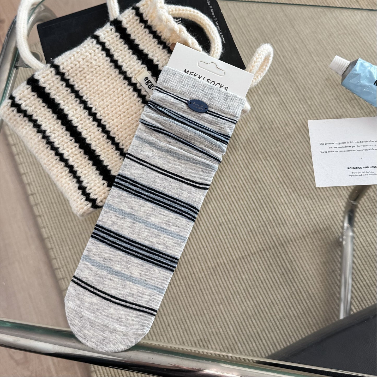 CHARM original light gray fine-stripe socks with blue button