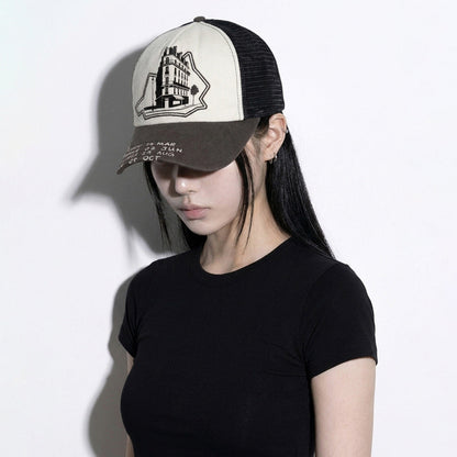 Model wearing the LOUNGE distressed canvas trucker hat side profile