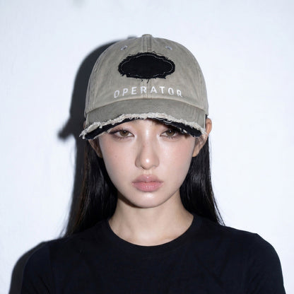 Model wearing REDRINSE OP distressed washed baseball cap front view