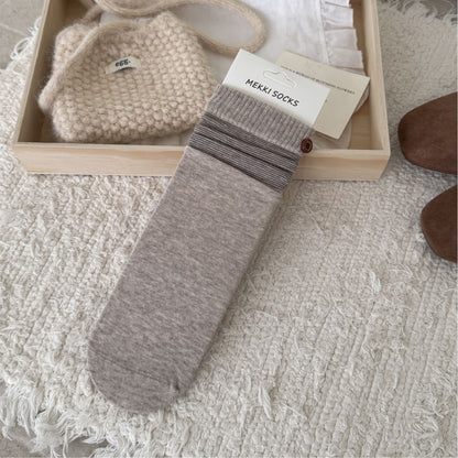 Pale khaki ribbed sock with a contrast striped cuff