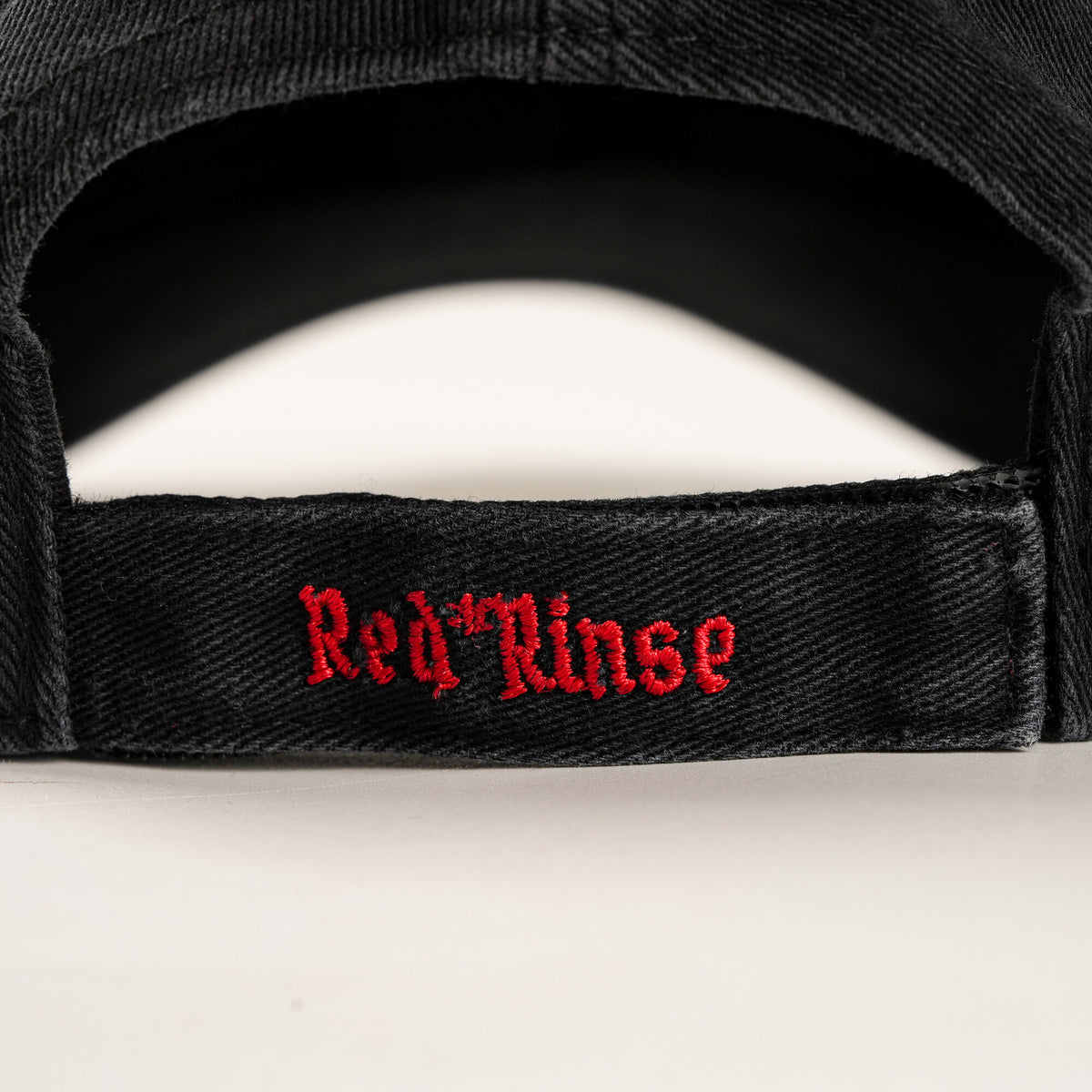 SUNBURN cap adjustable strap with REDRINSE embroidery