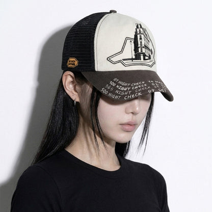Model wearing the LOUNGE trucker hat in three-quarter view