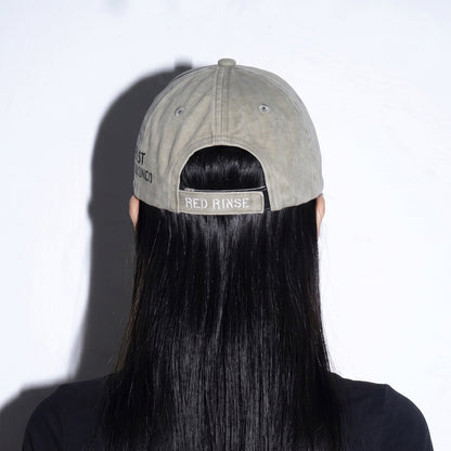 Model wearing REDRINSE OP distressed washed baseball cap back view