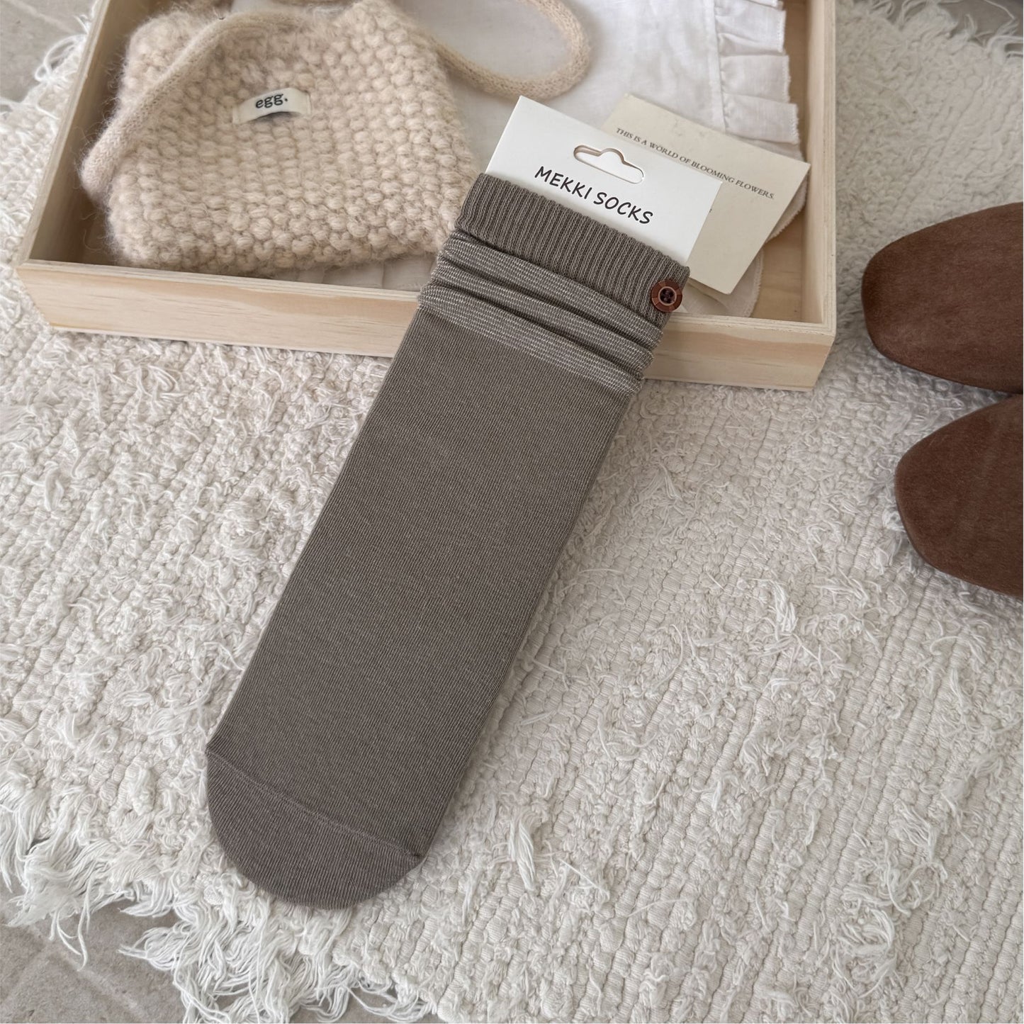 Taupe ribbed sock with a contrast striped cuff