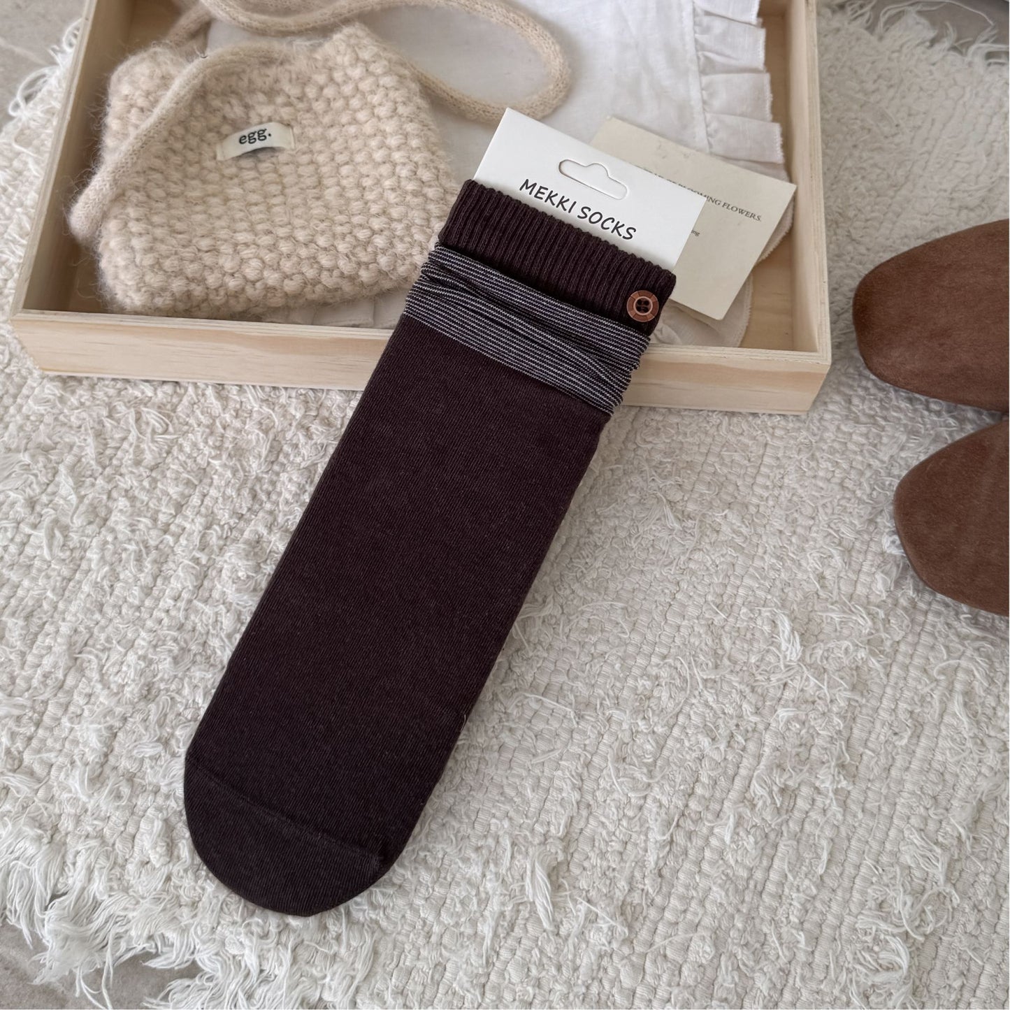 Burgundy ribbed sock with a contrast striped cuff