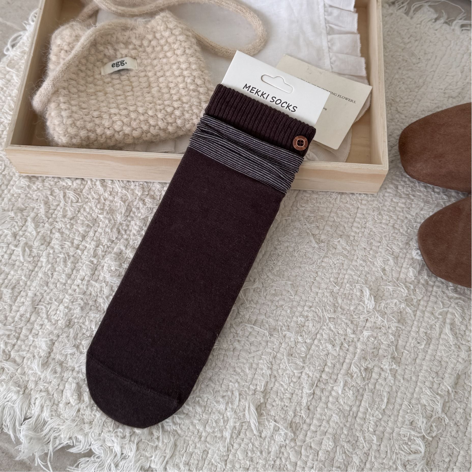 Burgundy ribbed sock with a contrast striped cuff
