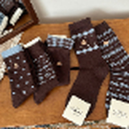 COCOA four-pair blue and brown patterned sock set flat lay