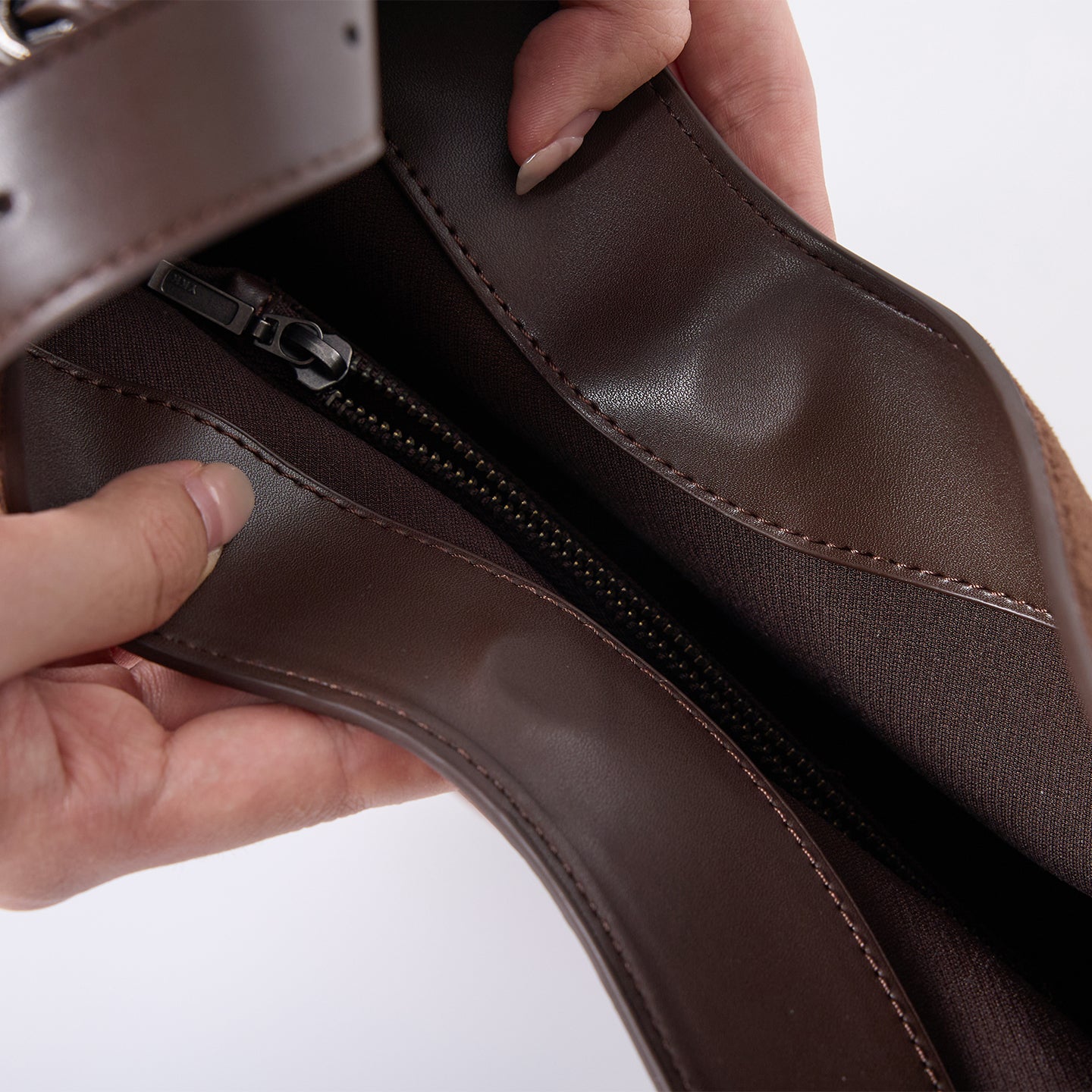 CRESCENT bag YKK zipper and smooth PU trim detail