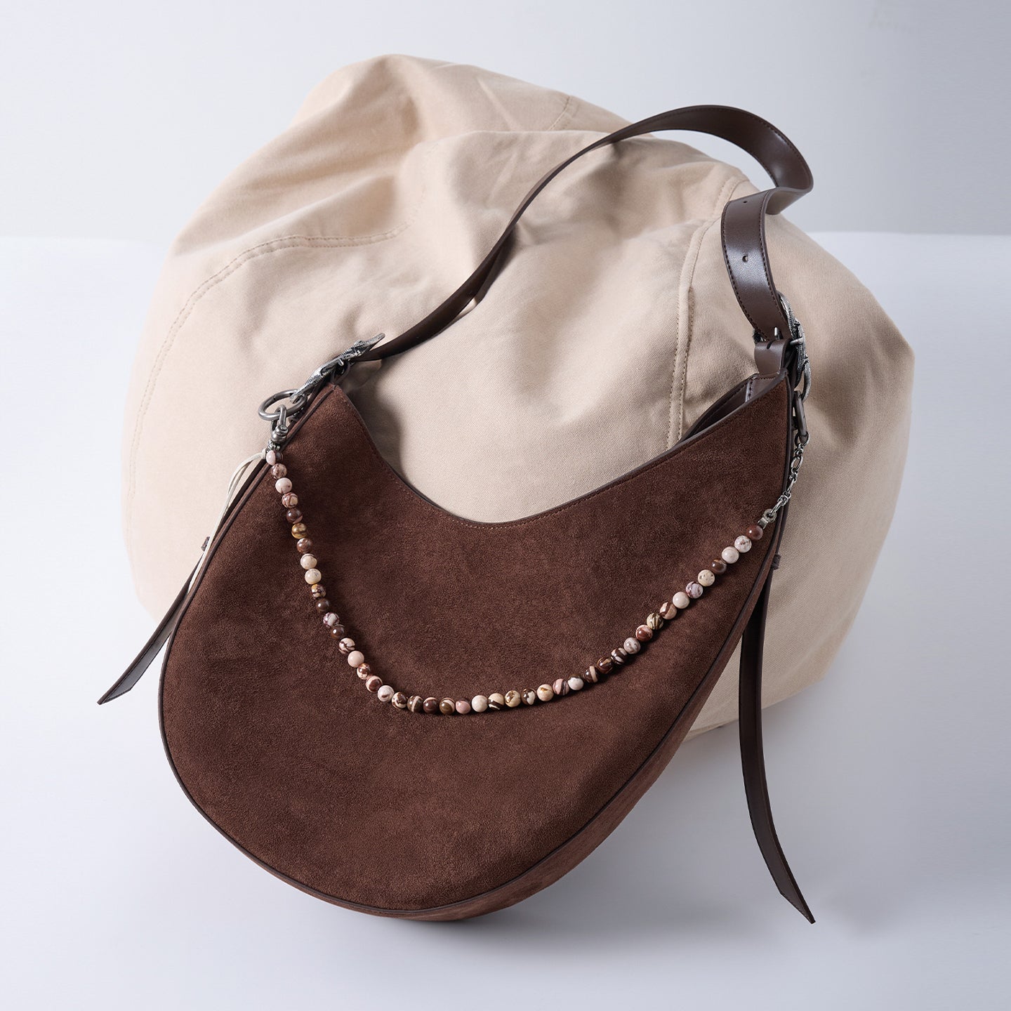 CRESCENT oak brown faux suede shoulder bag with decorative metal chain