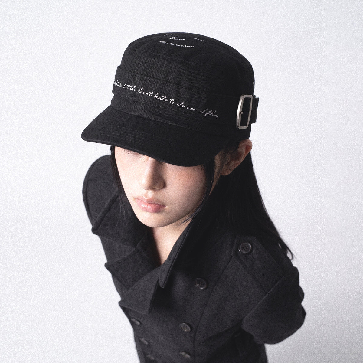 RHYTHM black cotton flat-top cap three-quarter styling