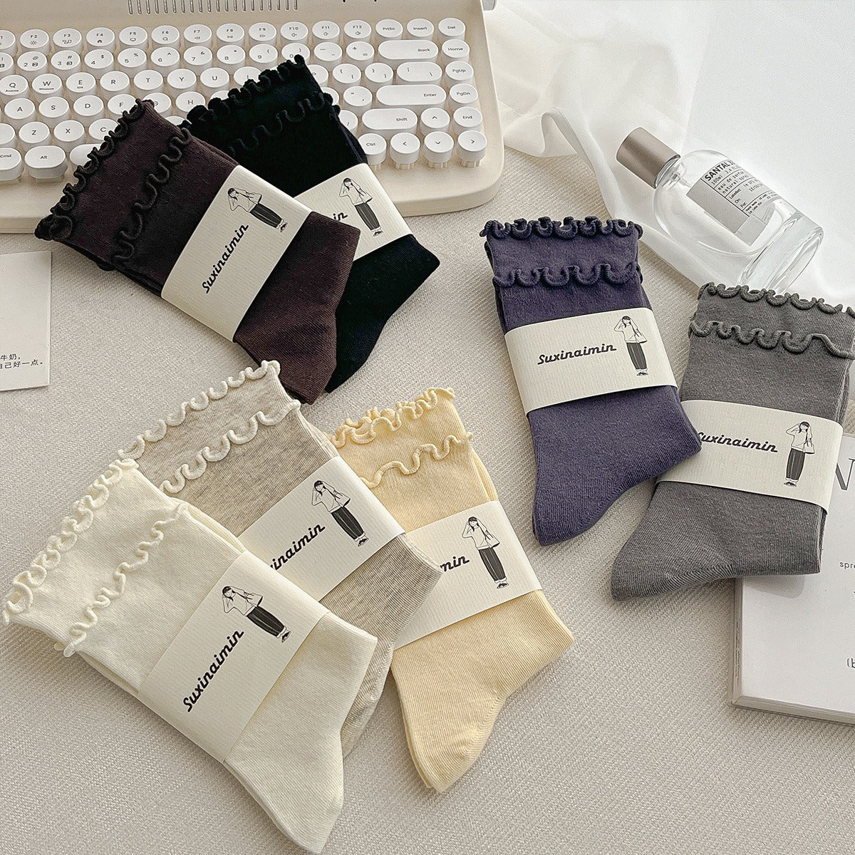 Seven-pair solid-color crew sock set flat lay