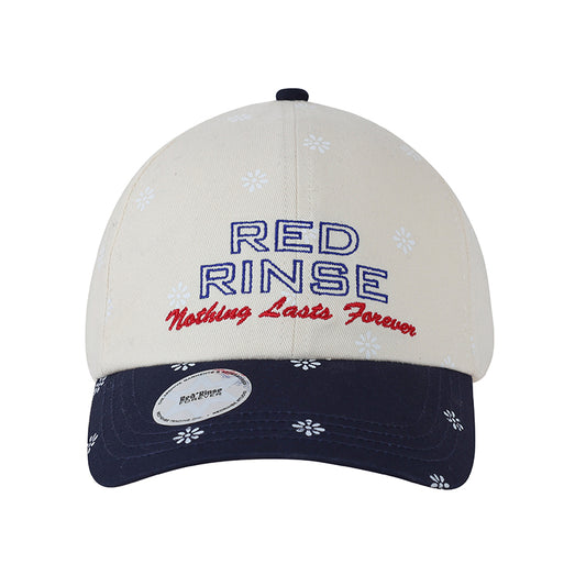 REDRINSE SNOWFLAKES cream and navy floral color-block baseball cap front view