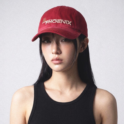 Model wearing the SUNBURN red star embroidered cap angled view