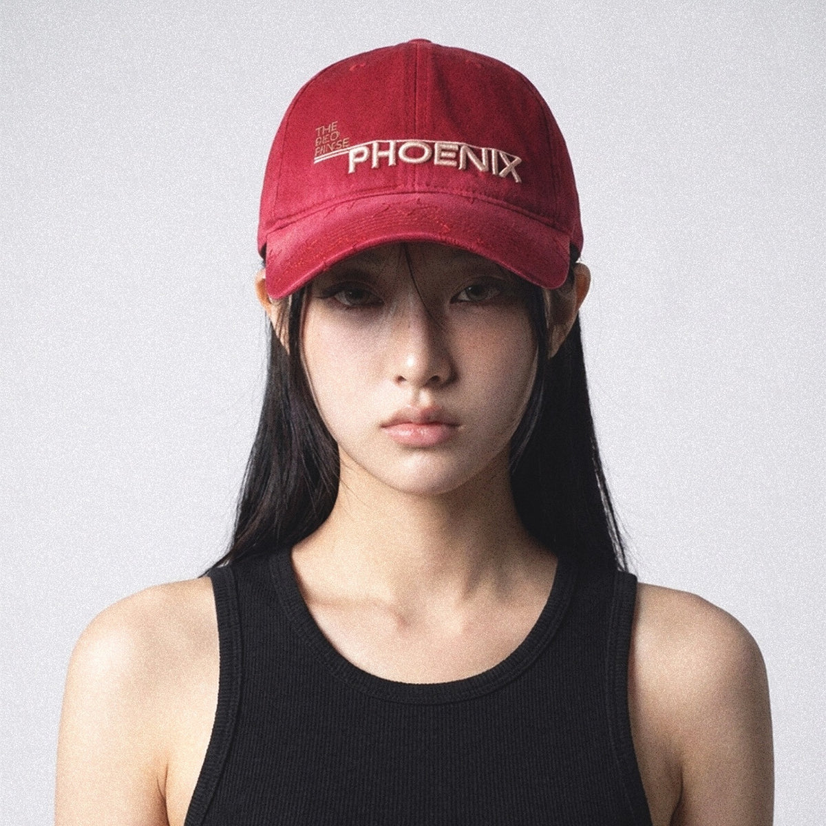 Model wearing the SUNBURN red star embroidered cap front view