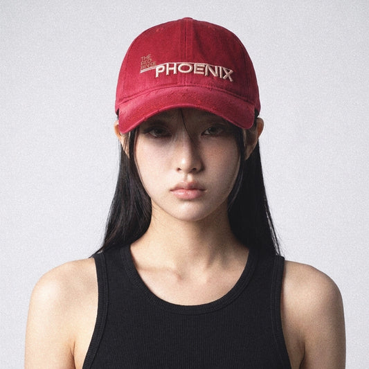 Model wearing the SUNBURN red star embroidered cap front view